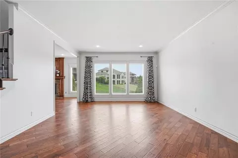 Living - 324 NW Thoreau Cir, Lees Summit, MO 64081 photo 4 of 17