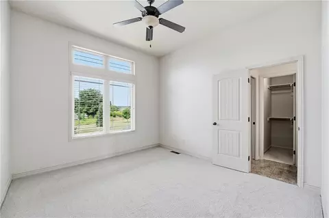 Bedroom - 324 NW Thoreau Cir, Lees Summit, MO 64081 photo 10 of 12
