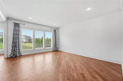 Living - 324 NW Thoreau Cir, Lees Summit, MO 64081 photo 3 of 17
