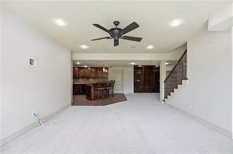 Living - 324 NW Thoreau Cir, Lees Summit, MO 64081 photo 14 of 17