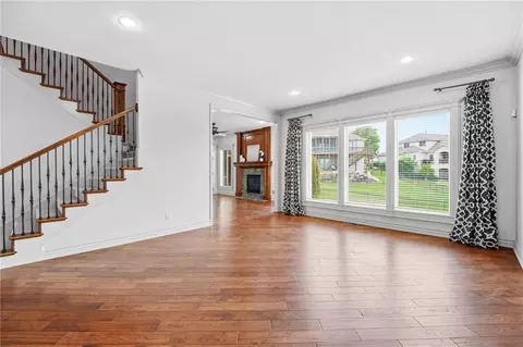 Living - 324 NW Thoreau Cir, Lees Summit, MO 64081 photo 5 of 17