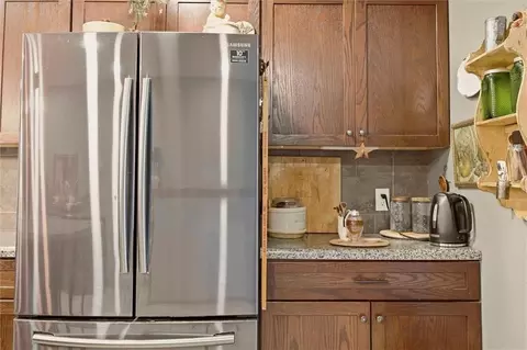 Kitchen - 409 SW 1200 Rd, Chilhowee, MO 64733 photo 3 of 5