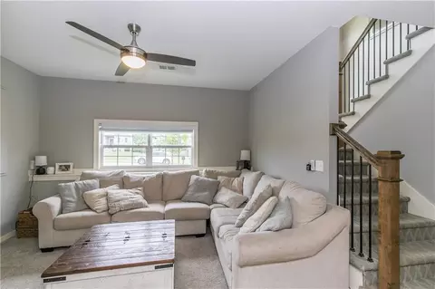 Living - 425 Spring Branch Dr, Raymore, MO 64083 photo 4 of 5