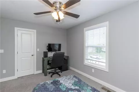 Bedroom - 425 Spring Branch Dr, Raymore, MO 64083 photo 4 of 7