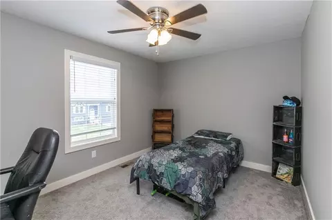 Bedroom - 425 Spring Branch Dr, Raymore, MO 64083 photo 3 of 7