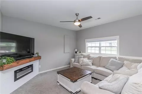 Living - 425 Spring Branch Dr, Raymore, MO 64083 photo 5 of 5