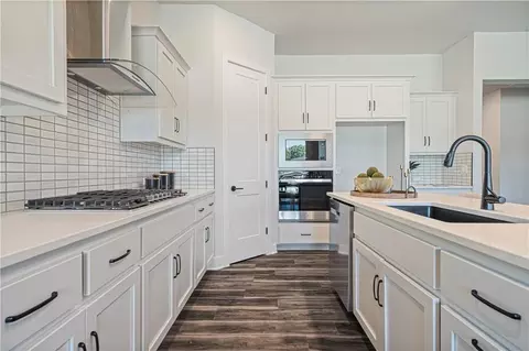 Kitchen - 1817 Woodward Cir, Raymore, MO 64083 photo 3 of 3