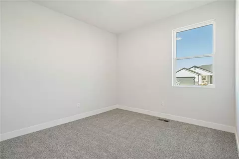 Bedroom - 1817 Woodward Cir, Raymore, MO 64083 photo 5 of 6