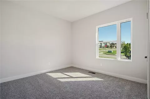 Bedroom - 1817 Woodward Cir, Raymore, MO 64083 photo 3 of 6
