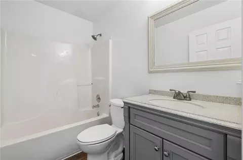 Bath - 712 S Sunset Ln, Raymore, MO 64083 photo 1 of 4
