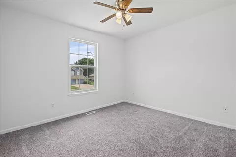 Bedroom - 712 S Sunset Ln, Raymore, MO 64083 photo 3 of 9