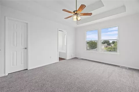 Bedroom - 712 S Sunset Ln, Raymore, MO 64083 photo 6 of 9