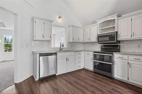 Kitchen - 712 S Sunset Ln, Raymore, MO 64083 photo 1 of 2