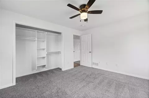 Bedroom - 712 S Sunset Ln, Raymore, MO 64083 photo 9 of 9