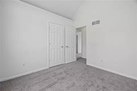 Bedroom - 712 S Sunset Ln, Raymore, MO 64083 photo 2 of 9