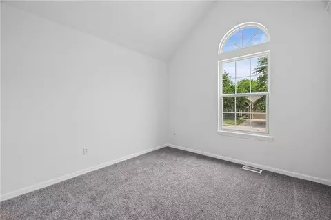 Bedroom - 712 S Sunset Ln, Raymore, MO 64083 photo 1 of 9