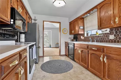 Kitchen - 408 E Walnut St, Odessa, MO 64076 photo 1 of 2