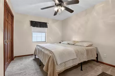 Bedroom - 408 E Walnut St, Odessa, MO 64076 photo 2 of 4