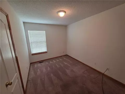 Bedroom - 404 Blue Grass Dr, Raymore, MO 64083 photo 4 of 4