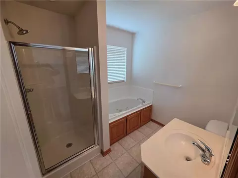 Bath - 404 Blue Grass Dr, Raymore, MO 64083 photo 1 of 4