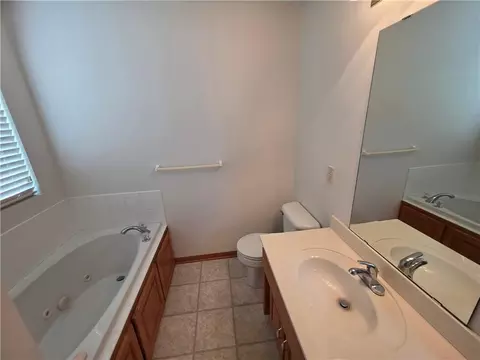 Bath - 404 Blue Grass Dr, Raymore, MO 64083 photo 2 of 4