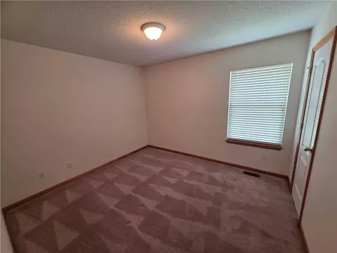 Bedroom - 404 Blue Grass Dr, Raymore, MO 64083 photo 3 of 4