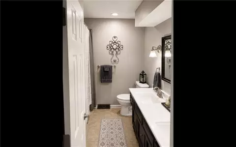 Bath - 506 S Monroe St, Raymore, MO 64083 photo 3 of 4