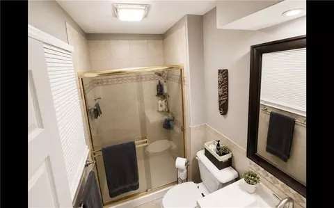 Bath - 506 S Monroe St, Raymore, MO 64083 photo 2 of 4