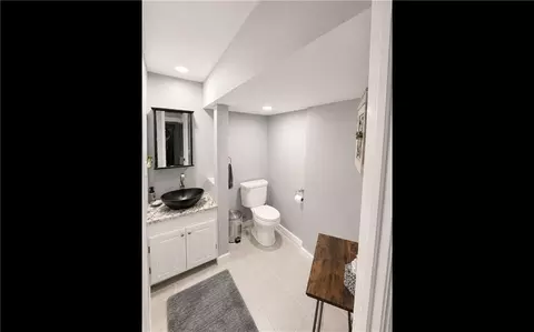 Bath - 506 S Monroe St, Raymore, MO 64083 photo 1 of 4