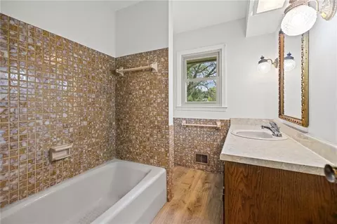 Bath - 503 S Park Dr, Raymore, MO 64083 photo 2 of 4