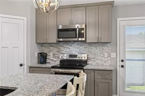 Kitchen - 1722 Joann Dr, Raymore, MO 64083 photo 2 of 4