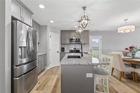 Kitchen - 1722 Joann Dr, Raymore, MO 64083 photo 3 of 4