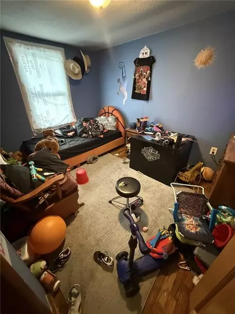 Bedroom - 104 N Main St, Chilhowee, MO 64733 photo 1 of 3
