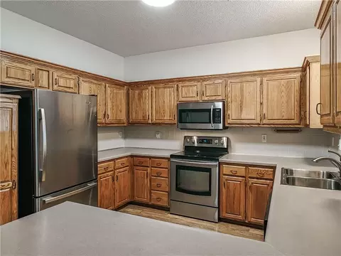 Kitchen - 2425 NE Old Paint Rd, Lees Summit, MO 64086 photo 2 of 5