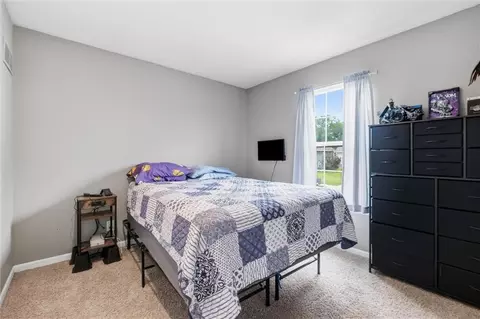 Bedroom - 903 Silver Lake Cir, Raymore, MO 64083 photo 2 of 2