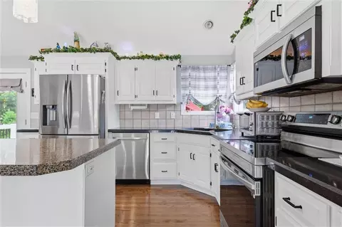 Kitchen - 903 Silver Lake Cir, Raymore, MO 64083 photo 2 of 3
