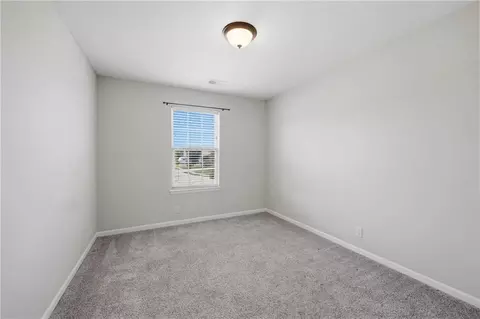 Bedroom - 408 Sunflower Dr, Raymore, MO 64083 photo 8 of 9