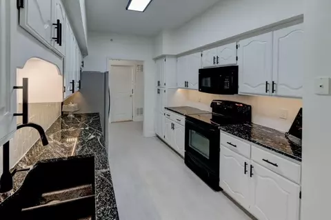 Kitchen - 17800 Bolger Rd #247A, Independence, MO 64055 photo 5 of 7