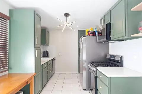Kitchen - 10813 E 58th Ter, Raytown, MO 64133 photo 3 of 6