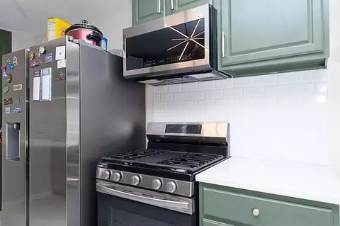 Kitchen - 10813 E 58th Ter, Raytown, MO 64133 photo 2 of 6