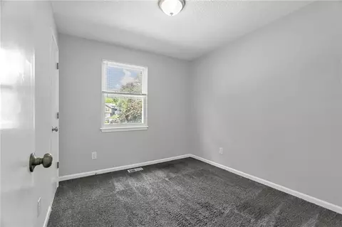 Bedroom - 405 SE Onyx Cir, Lees Summit, MO 64063 photo 3 of 8