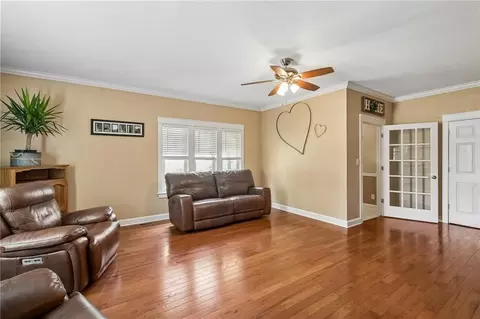 Living - 108 E Bates St, Drexel, MO 64742 photo 2 of 3