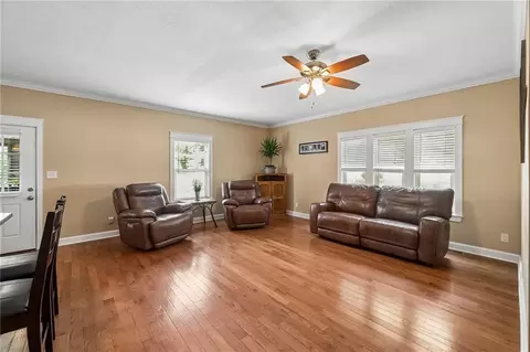 Living - 108 E Bates St, Drexel, MO 64742 photo 1 of 3