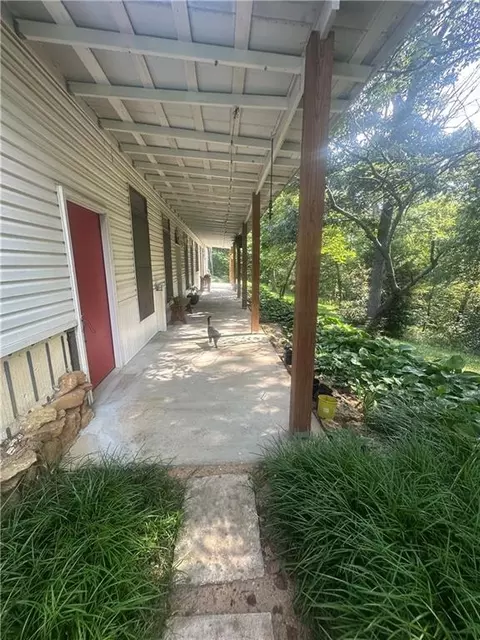 Exterior - 321 NW 1071st Rd, Centerview, MO 64019 photo 5 of 10