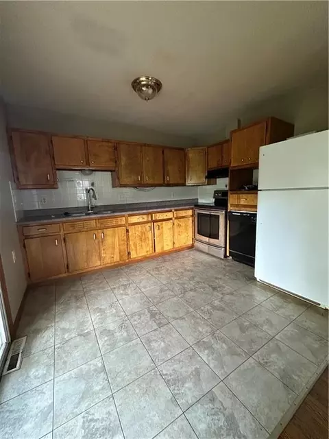 Kitchen - 8404 Booth Ave, Raytown, MO 64138 photo 1 of 1