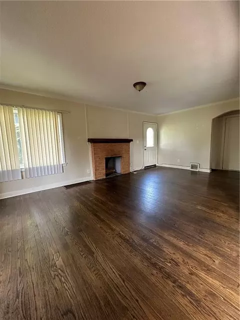 Living - 1701 E Mechanic Ave, Independence, MO 64050 photo 1 of 3