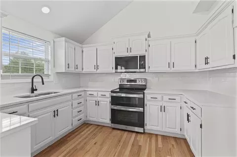 Kitchen - 1106 Creekside Ct, Raymore, MO 64083 photo 1 of 2