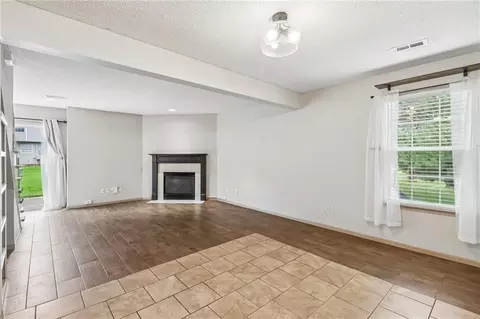 Living - 1347 SE Broadway Cir, Lees Summit, MO 64081 photo 1 of 4