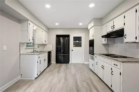 Kitchen - 705 NE Darwin St, Lees Summit, MO 64063 photo 1 of 2