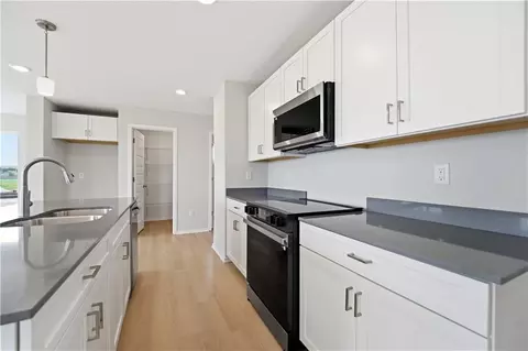 Kitchen - 1328 SE Windbreak Dr, Lees Summit, MO 64081 photo 2 of 2